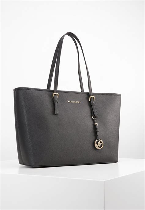 michael kors jet set black handbag|michael kors jet set airplane.